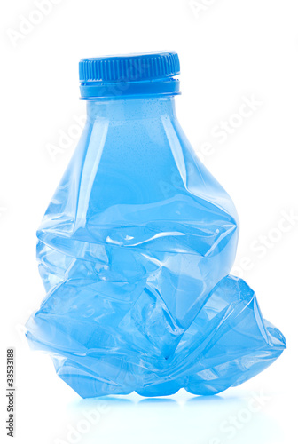 Photo: Squashed plastic bottle ready to recycle. Squashed plastic bottle ready to recycle.