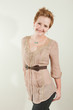 Smiling stylish redhead young woman