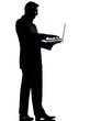 one business man silhouette computing computer laptop