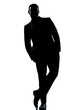 one business man standing Full length hands in pocket silhouette