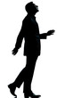 one business man walking looking up silhouette