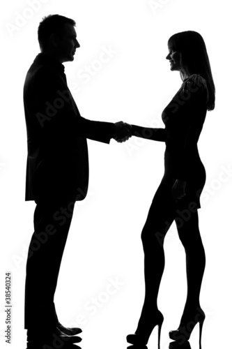 Photo: one couple man and woman handshake one couple man and woman handshake