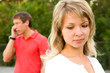Conflict between man and woman outdoors