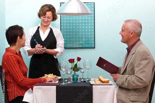 Photo: Waitress taking an order in a restaurant Waitress taking an order in a restaurant