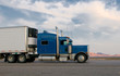 Details der Fotografie Blue truck moving on a highway