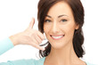 woman making a call me gesture