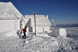 Snow covered, frozen meteorological station