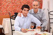 Two generations sitting in a restaurant