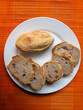 Dish of bread on bamboo mat