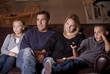 Photo: Family watching Television together Family watching Television together