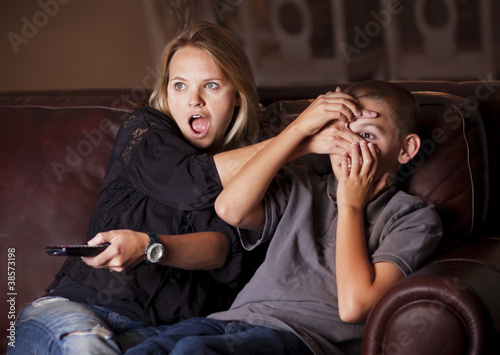 Photo: Parent Guarding Son Against Questionable TV Content Parent Guarding Son Against Questionable TV Content