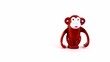 Clockwork brown toy monkey sideway walk from right to left