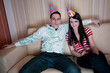 Foto: Couple In Party Hats Couple In Party Hats