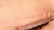 Video: Single eye closeup, eyelid lifts and pupil expands Single eye closeup, eyelid lifts and pupil expands