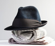 classic hat on a newspaper