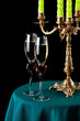 two glasses of wine and a candlestick
