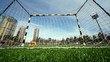 Goalkeeper in gate at football game on stadium Goalkeeper in gate at football game on stadium