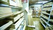 Several wooden frames are on shelves in store