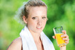 Woman drinking juice after exercise