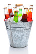 Photo: Assorted Soda Bottles in Ice Bucket Assorted Soda Bottles in Ice Bucket
