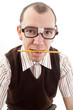 Nerdy guy biting pencil