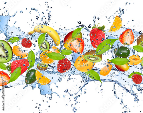 Photo: Fresh fruits in water splash, isolated on white background Fresh fruits in water splash, isolated on white background