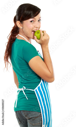 Photo: Young woman with an apple against white background Young woman with an apple against white background