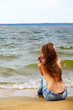 Foto: topless girl on beach topless girl on beach