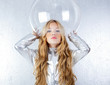 Astronaut girl with silver uniform and glass helmet Astronaut girl with silver uniform and glass helmet