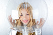 Astronaut girl with silver uniform and glass helmet Astronaut girl with silver uniform and glass helmet