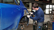 Car body worker. Car body worker.