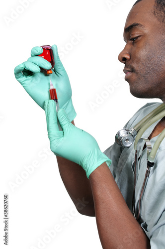 Photo: Doctor with a Syringe Doctor with a Syringe