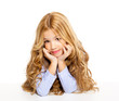 blond kid little girl portrait smiling on a desk in white
