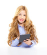 blond student kid with ebook tablet pc portrait in desk