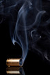 Smoking bullet casing