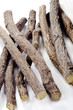 Liquorice root lying on a bright surface