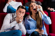 Photo: Couple and other people in cinema Couple and other people in cinema