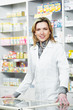 Pharmacy chemist woman in drugstore