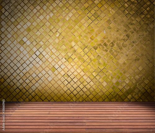 Photo: golden mosaic wall and wood floor golden mosaic wall and wood floor
