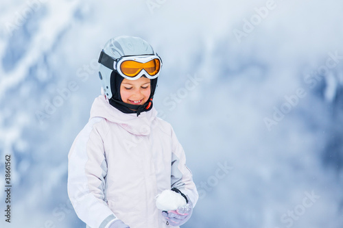 Photo: Young girl a ski wear Young girl a ski wear