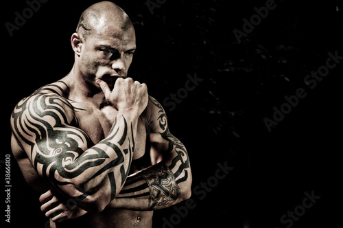 Photo: Handsome Bodybuilder With Bodyart Handsome Bodybuilder With Bodyart