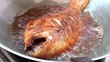 Big fish frying in hot oil