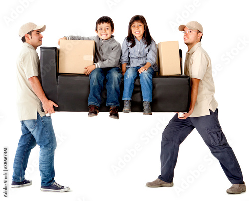 Photo: Delivery men carrying a couch Delivery men carrying a couch