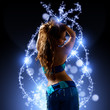 Photo: oriental Bellydancer and blue light streaks oriental Bellydancer and blue light streaks