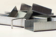Several metallic stapler staples