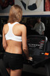 Back of running woman on toe cam