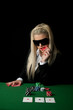 Sexy girl playing poker in Casino