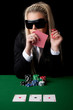 Sexy blond playing poker