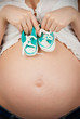 abdomen of pregnant women and crocheted boots