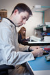 Detalii fotografie Engineer testing a circuit board assembly